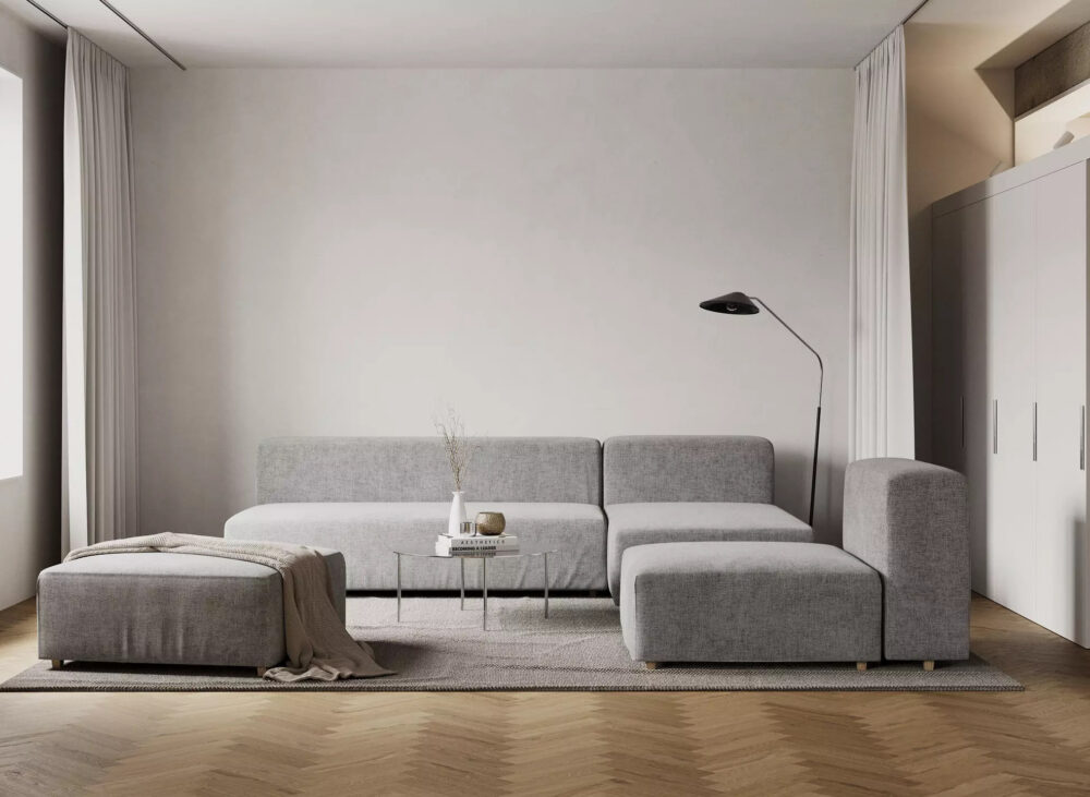 Salon z sofą modułową i podłogą w jodełkę